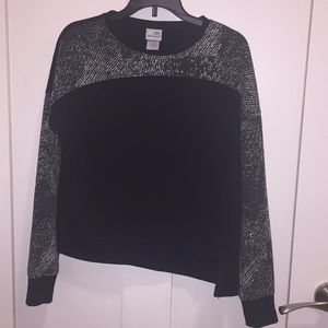 Women’s black top. Champion.